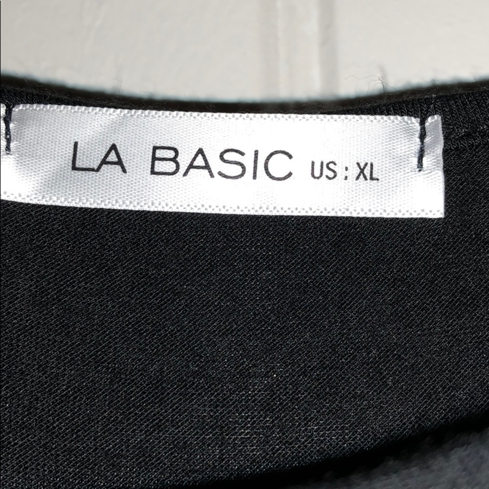 Simple Black Dress with Ruffle Bottom - Picture 2 of 2
